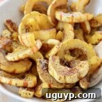 sliced, roasted delicata squash in bowl
