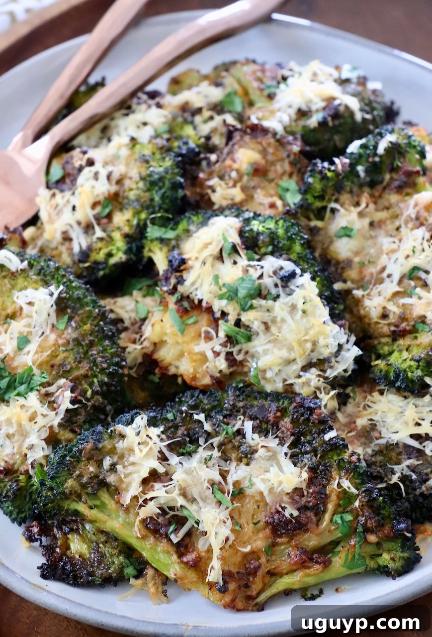 Crispy Smashed Broccoli with Lemon Garlic Butter and Parmesan on a Plate