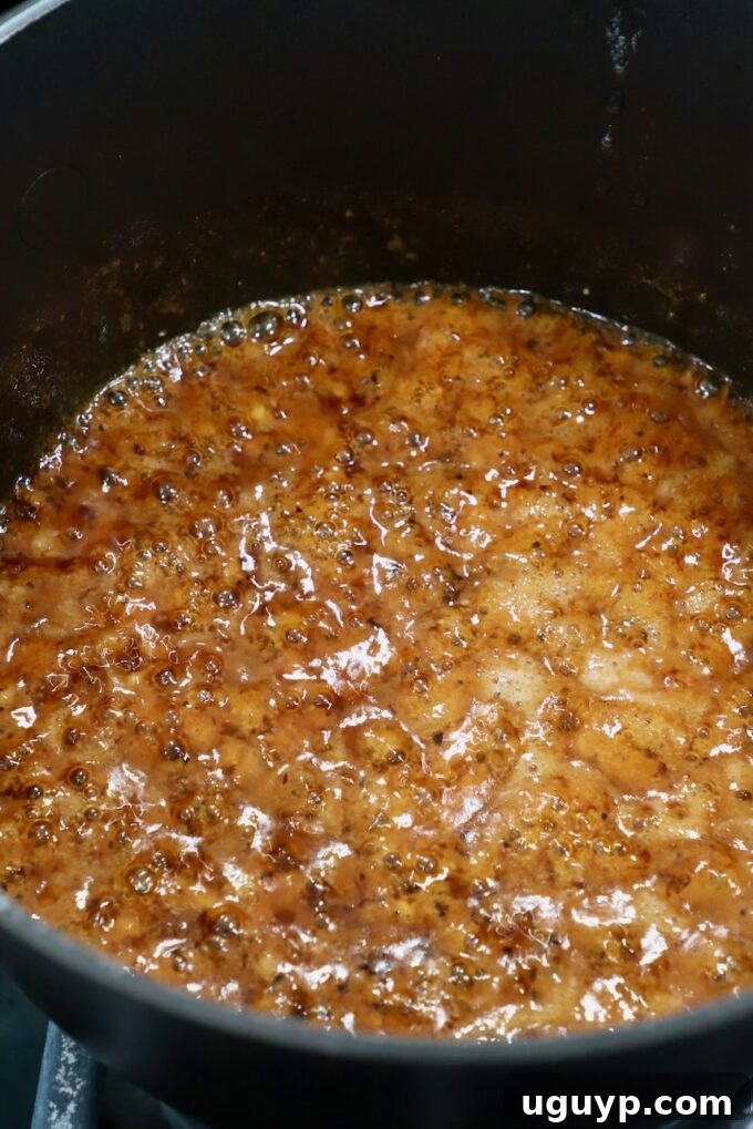 Seasoned butter gently bubbling in the saucepan, infusing with flavors