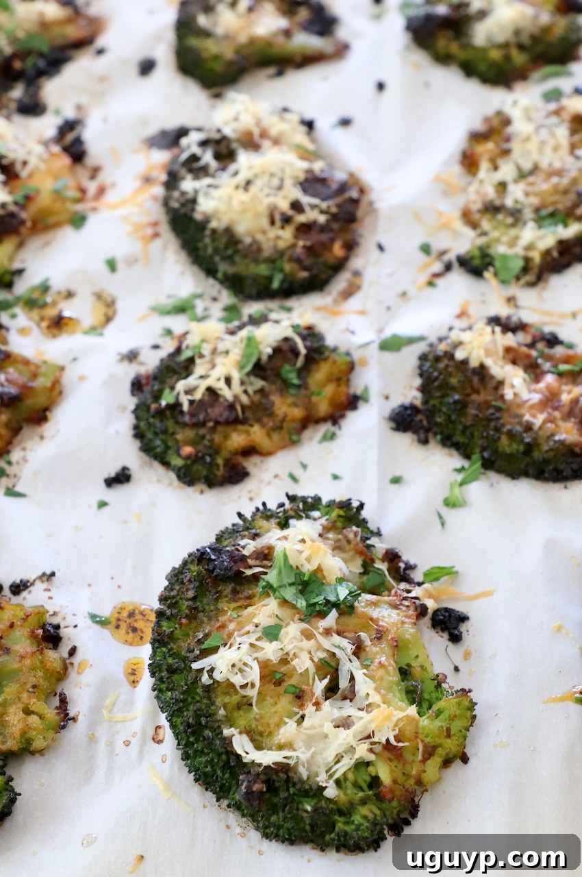 Roasted Smashed Broccoli with Parmesan, hot out of the oven on a baking sheet