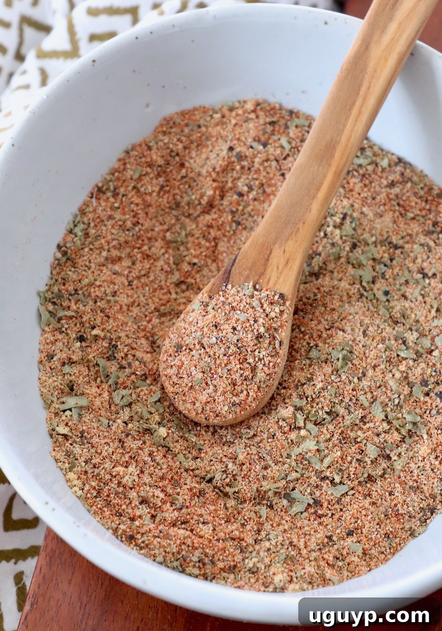 meatloaf seasoning in bowl with wood spoon