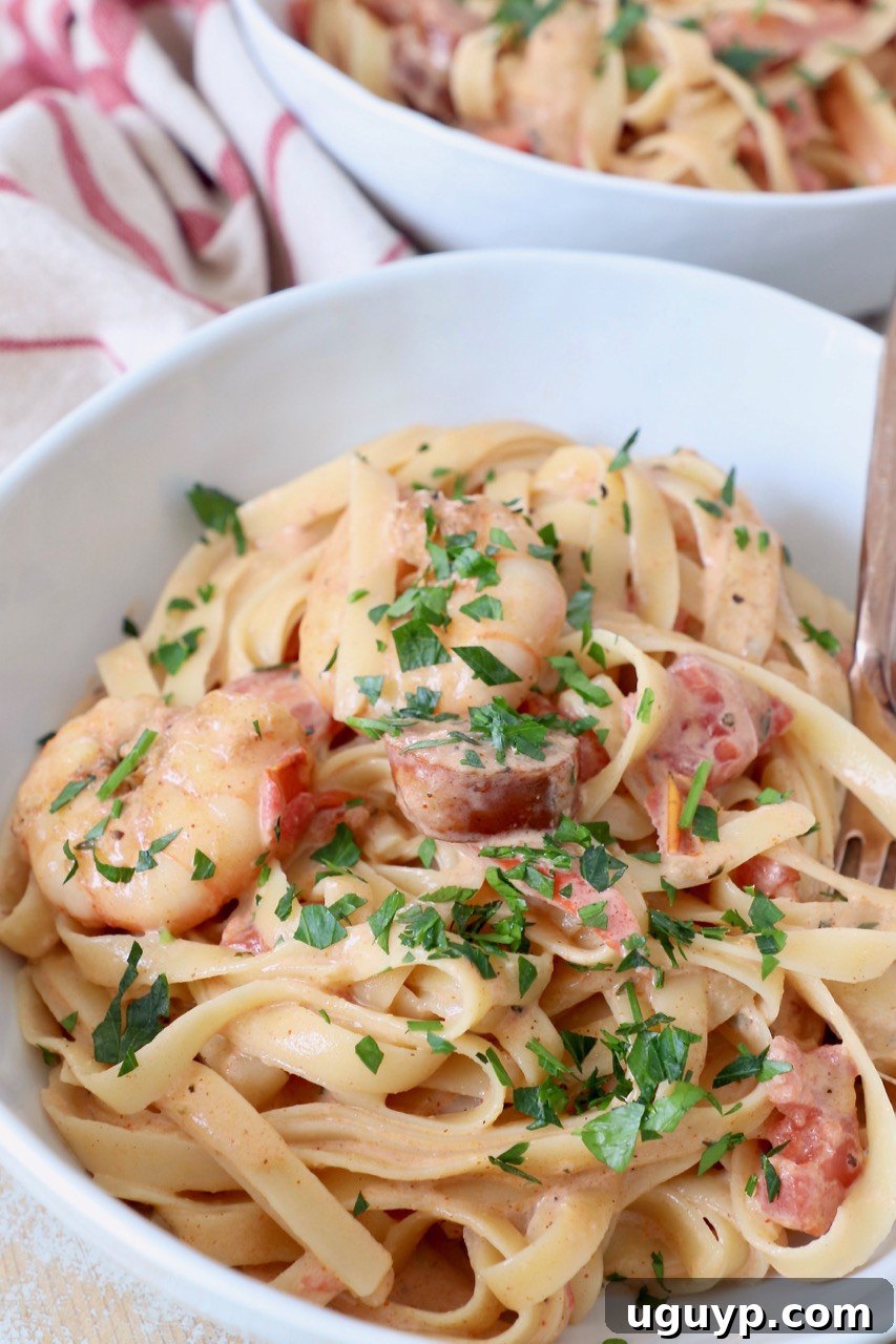 Creamy Cajun Shrimp Pasta with Andouille Sausage in a bowl