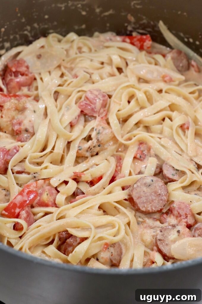 Cajun Shrimp Pasta with sausage in a large pot