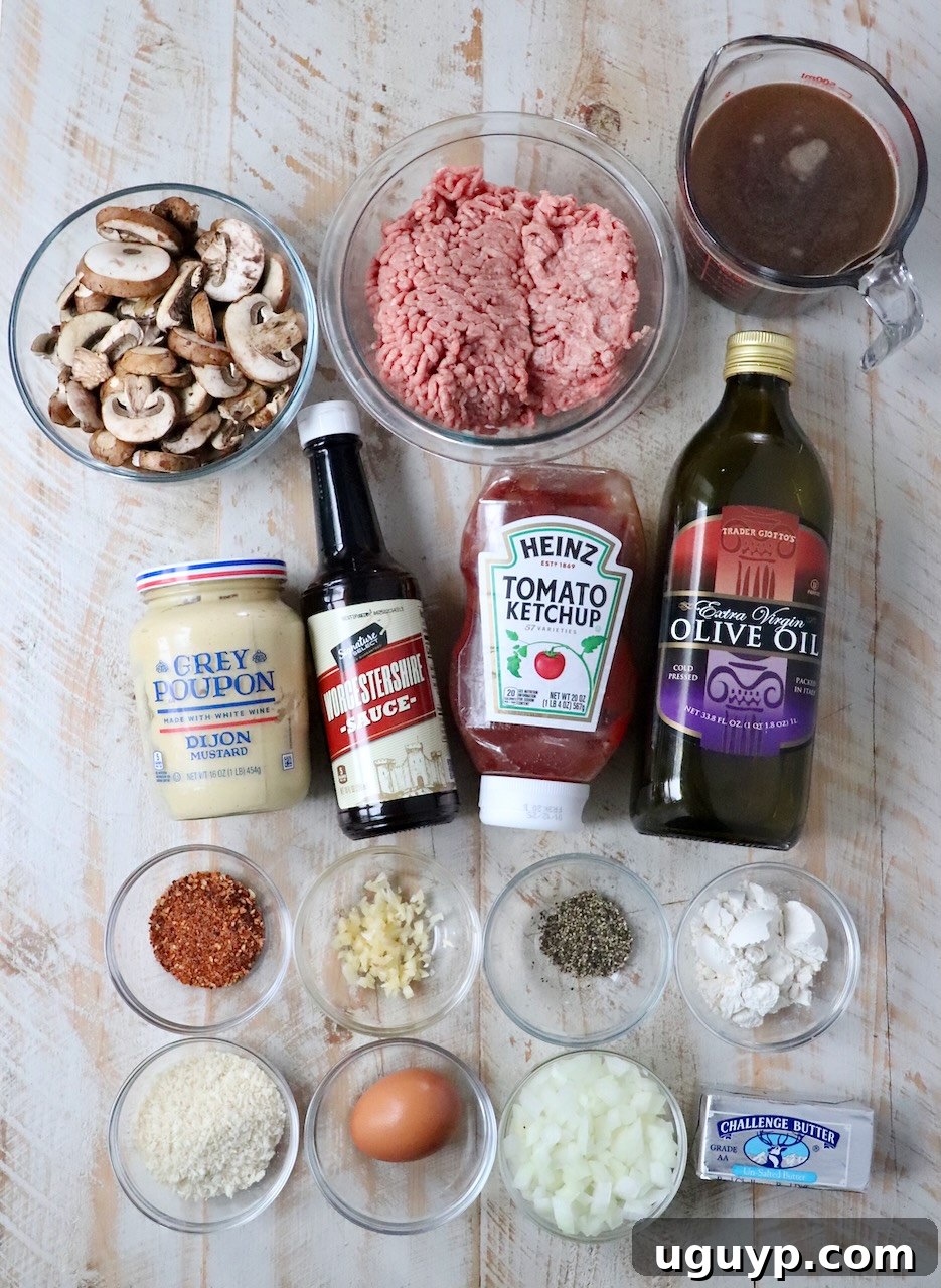 ingredients for salisbury steak on white wood board
