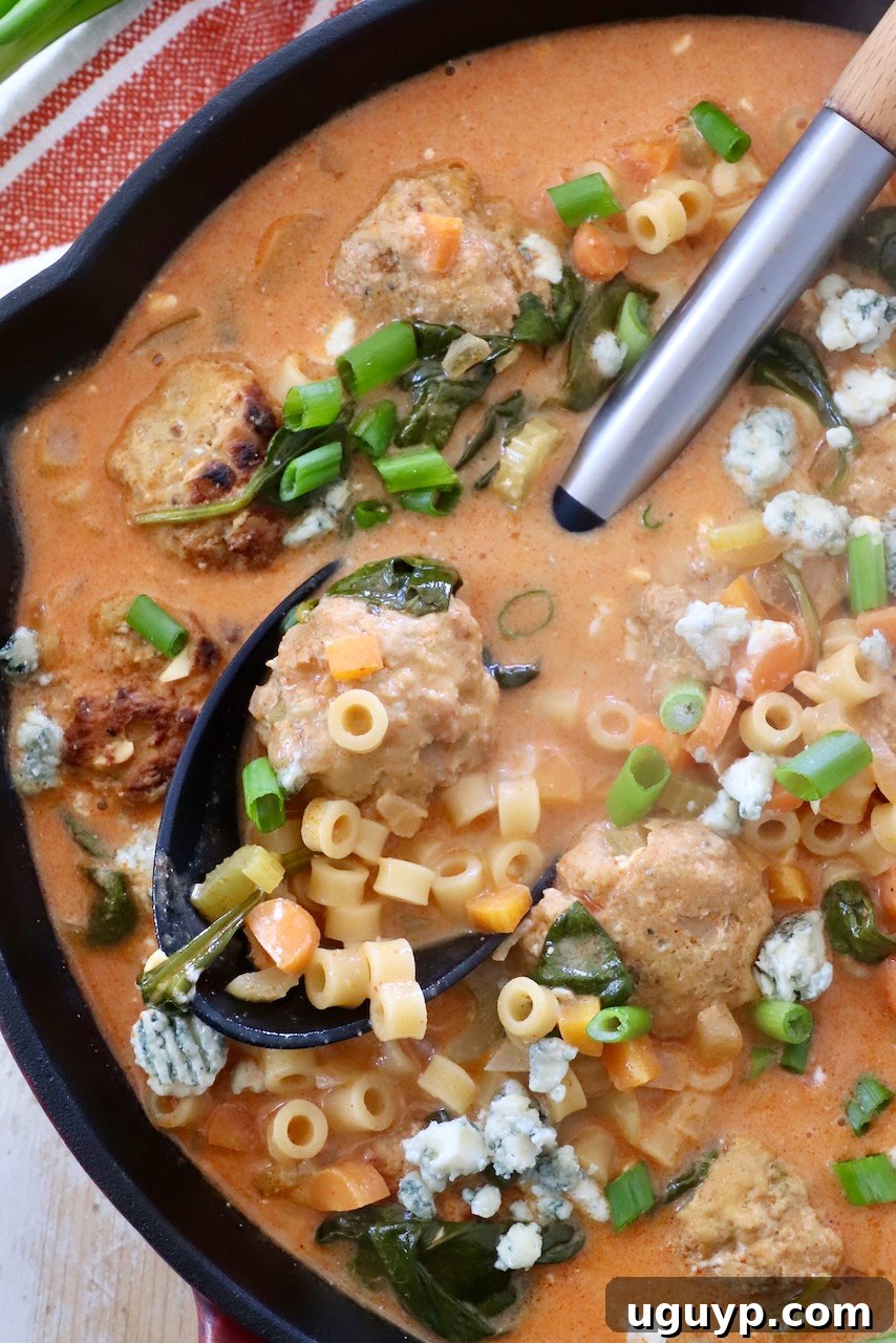 Creamy Buffalo Chicken Meatball Soup served in a skillet, ready to be enjoyed.