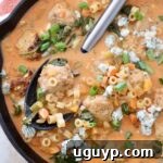 buffalo chicken meatball soup in skillet with spoon