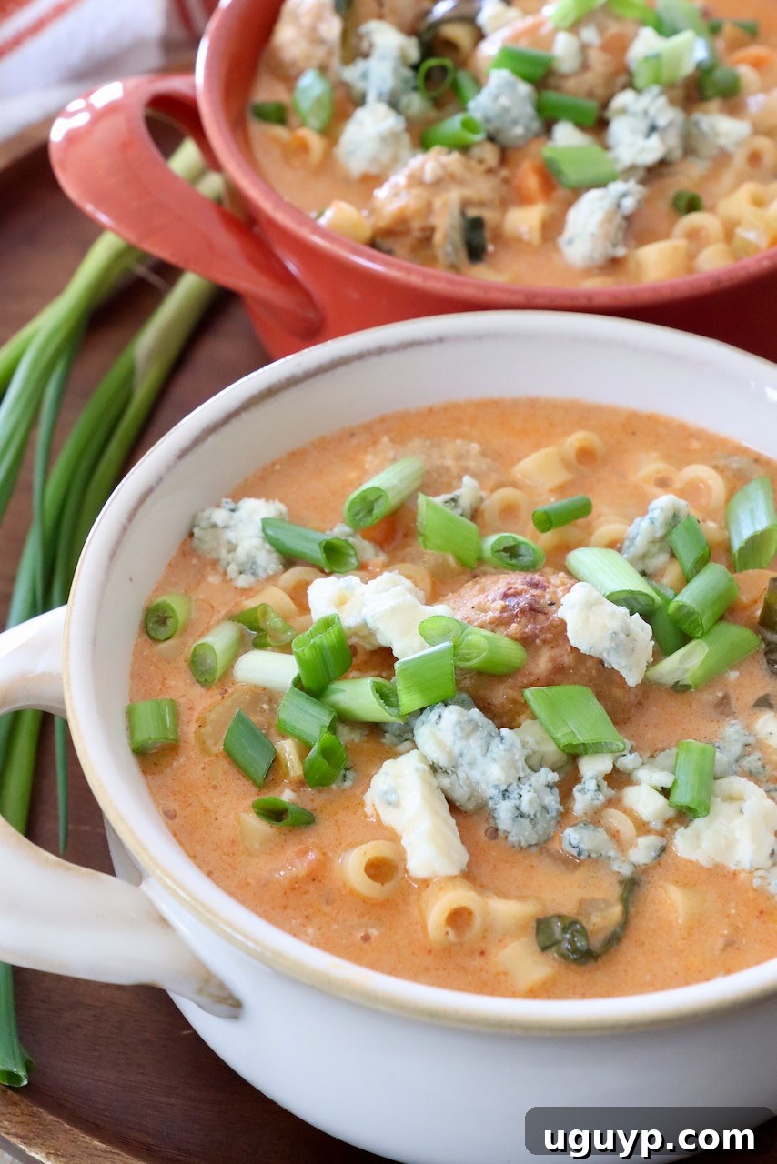 Multiple bowls of creamy Buffalo Chicken Soup ready to eat.
