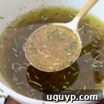 Italian dressing in bowl and spoon