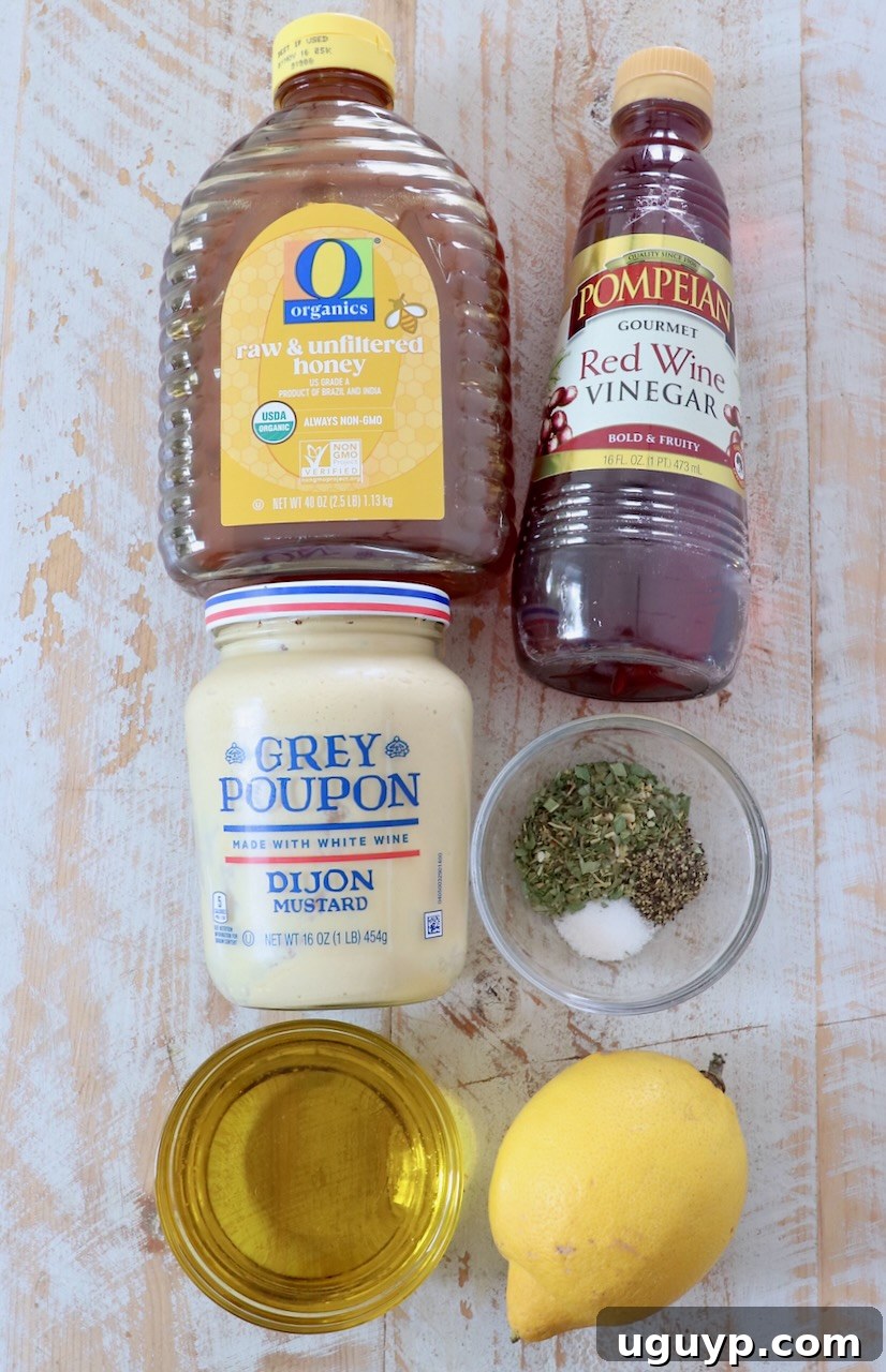 ingredients for Italian dressing on white wood board