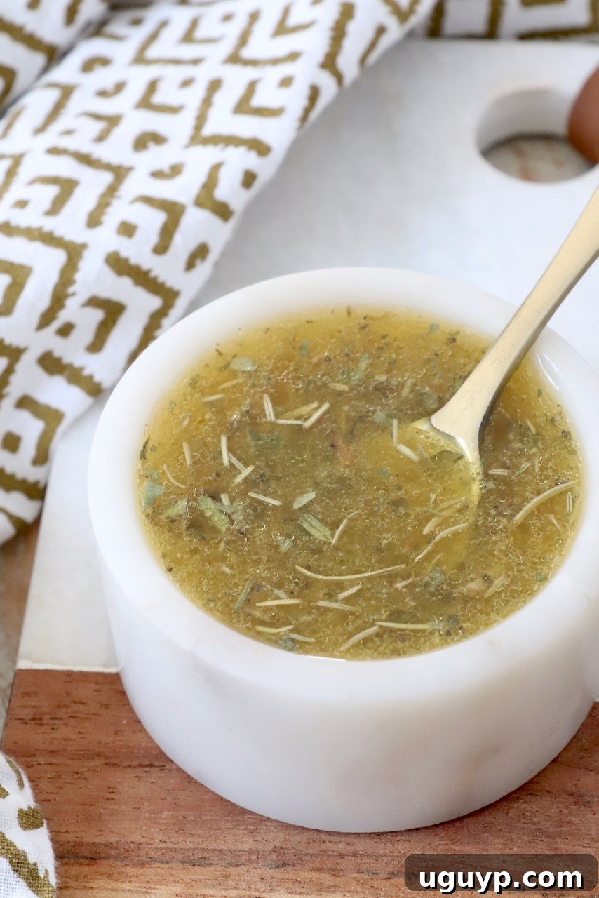 Italian dressing in small bowl with spoon