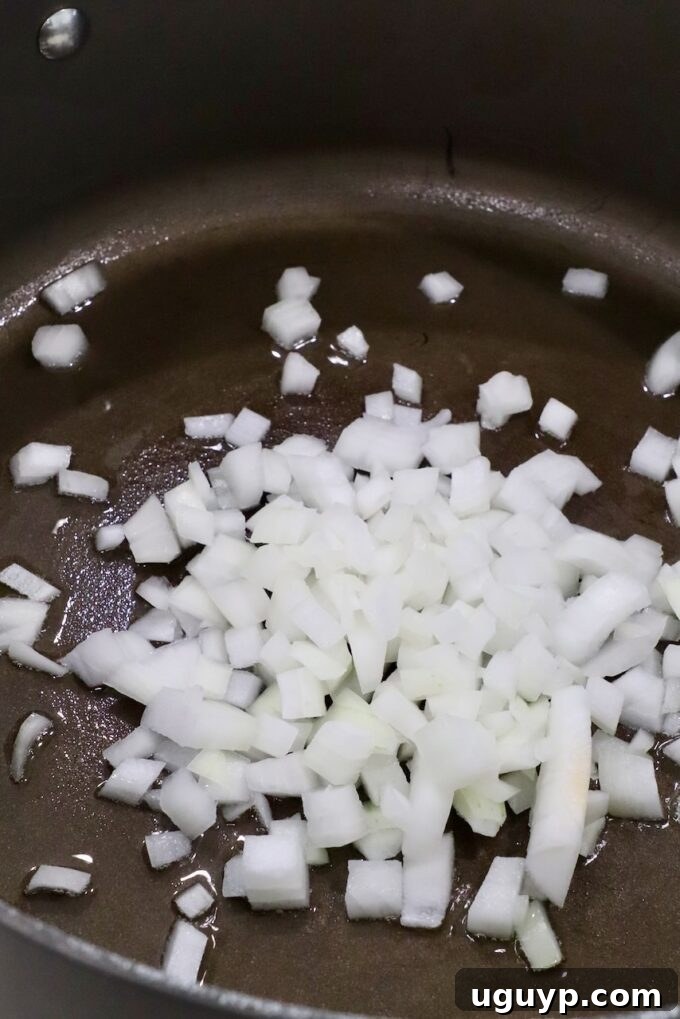 diced onions in large pan