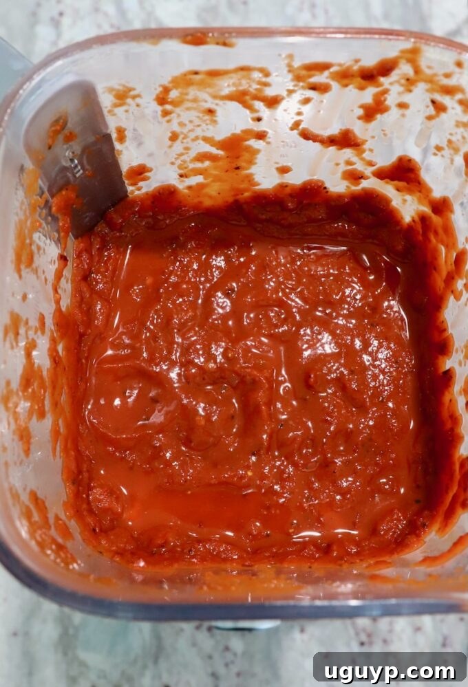 pureed chili tomato sauce in blender