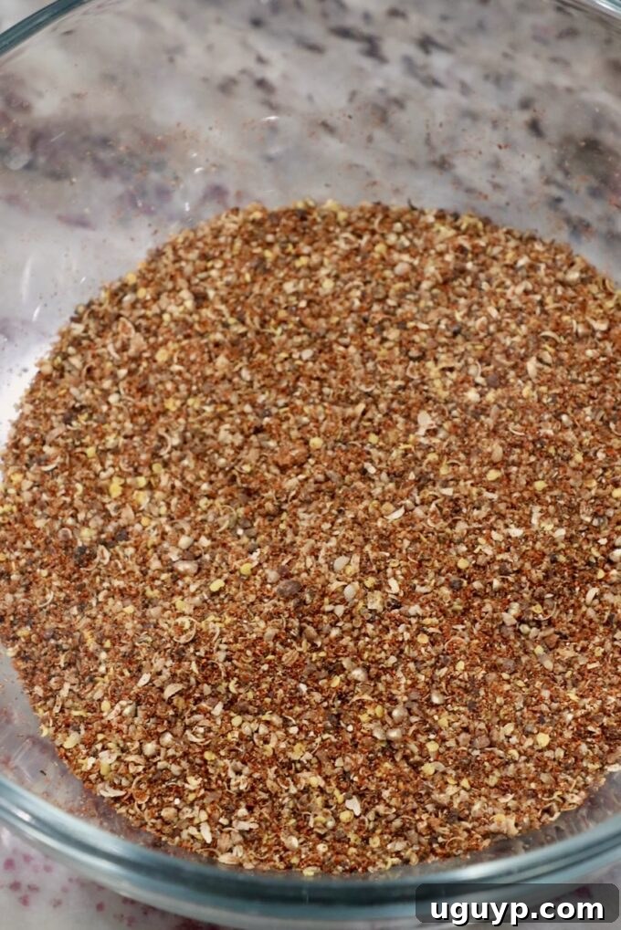 finished pastrami seasoning in a glass bowl, ready to be applied to the brisket