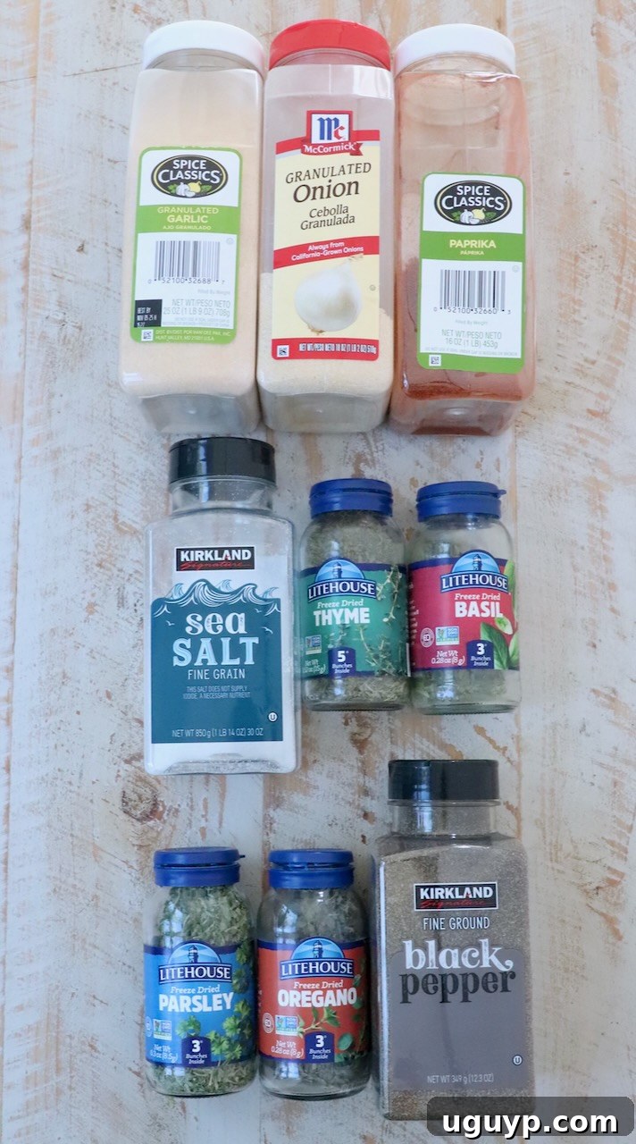 ingredients for homemade vegetable seasoning laid out on a white wooden board before mixing