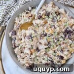chicken salad in bowl with spoon