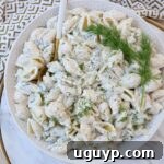 pickle pasta salad in bowl with dill