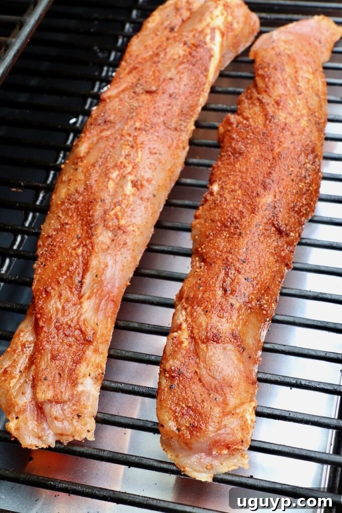 seasoned pork tenderloins on smoker