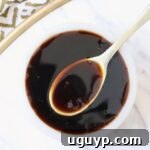 teriyaki sauce in small bowl with spoon