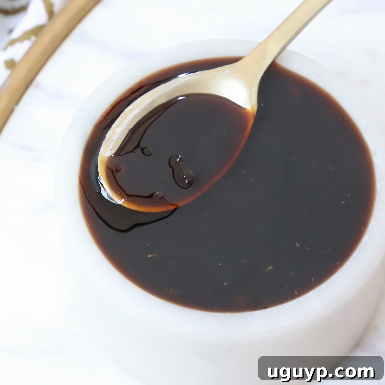 teriyaki sauce in bowl with spoon