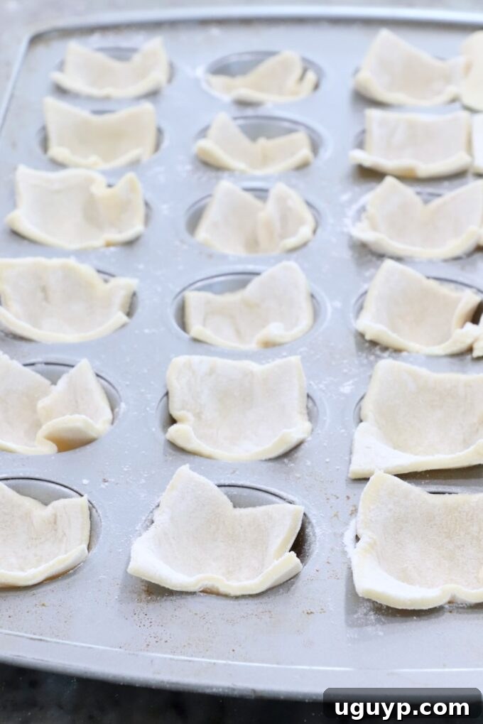 puff pastry dough in a mini muffin tin