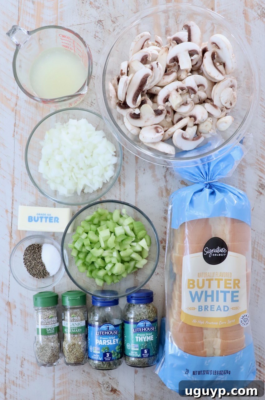 ingredients for mushroom stuffing on a white wood board