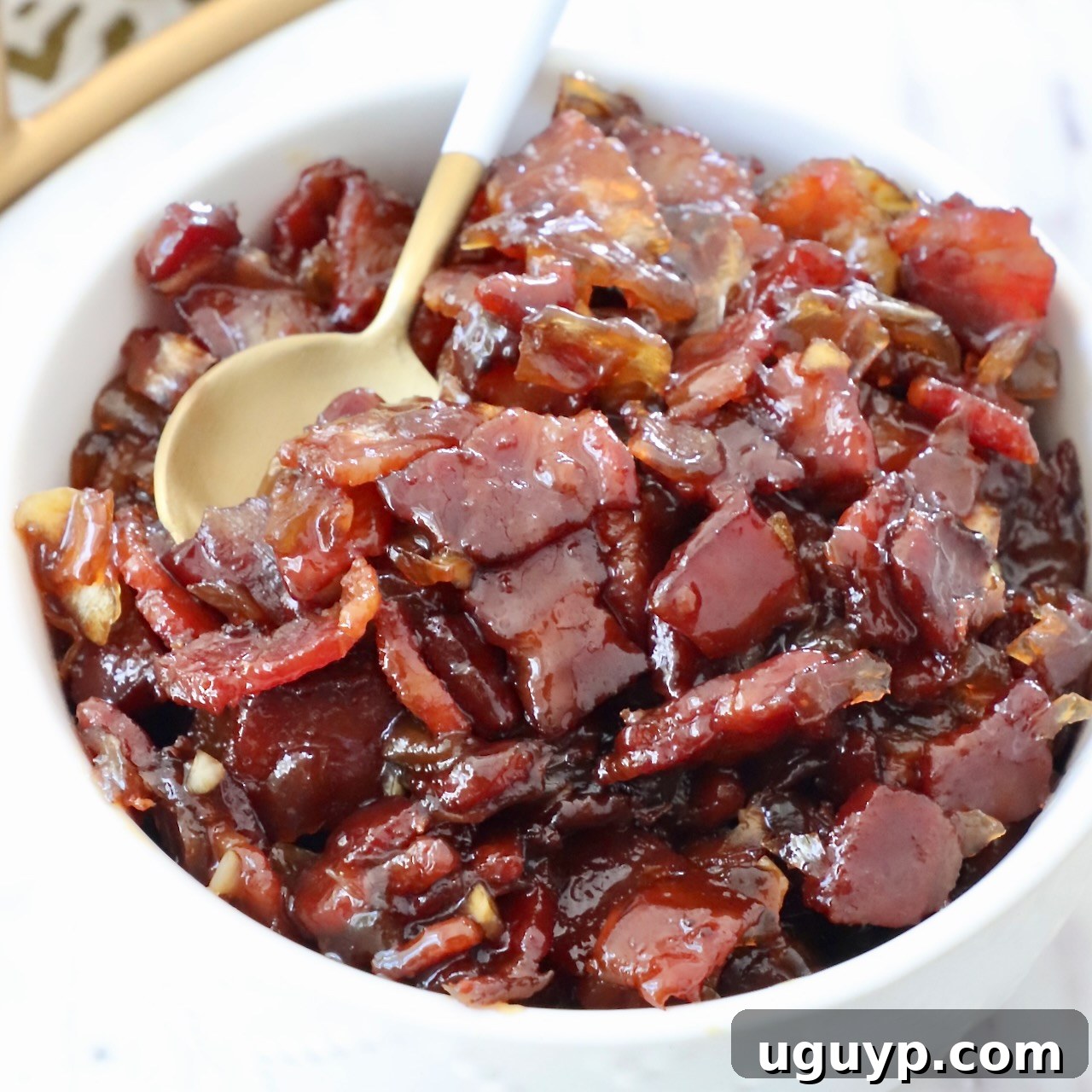 Bacon jam in a bowl with a spoon