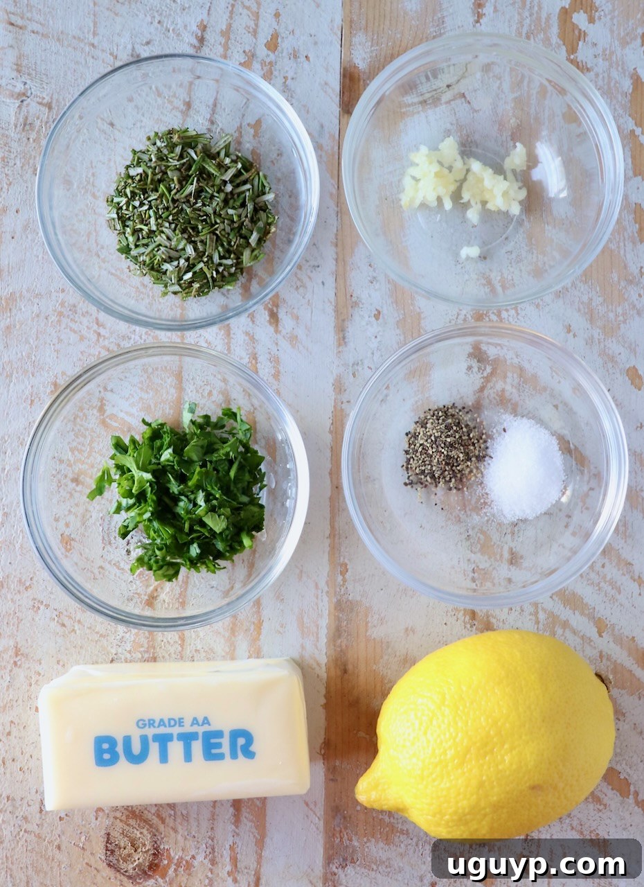 ingredients for compound butter on a white wood board