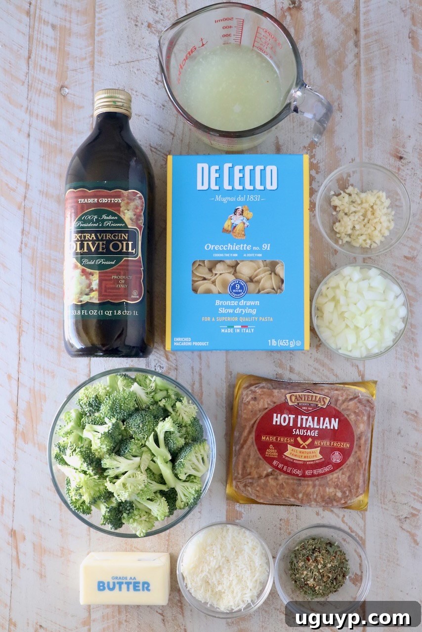 ingredients for orecchiette pasta recipe on a white wood board