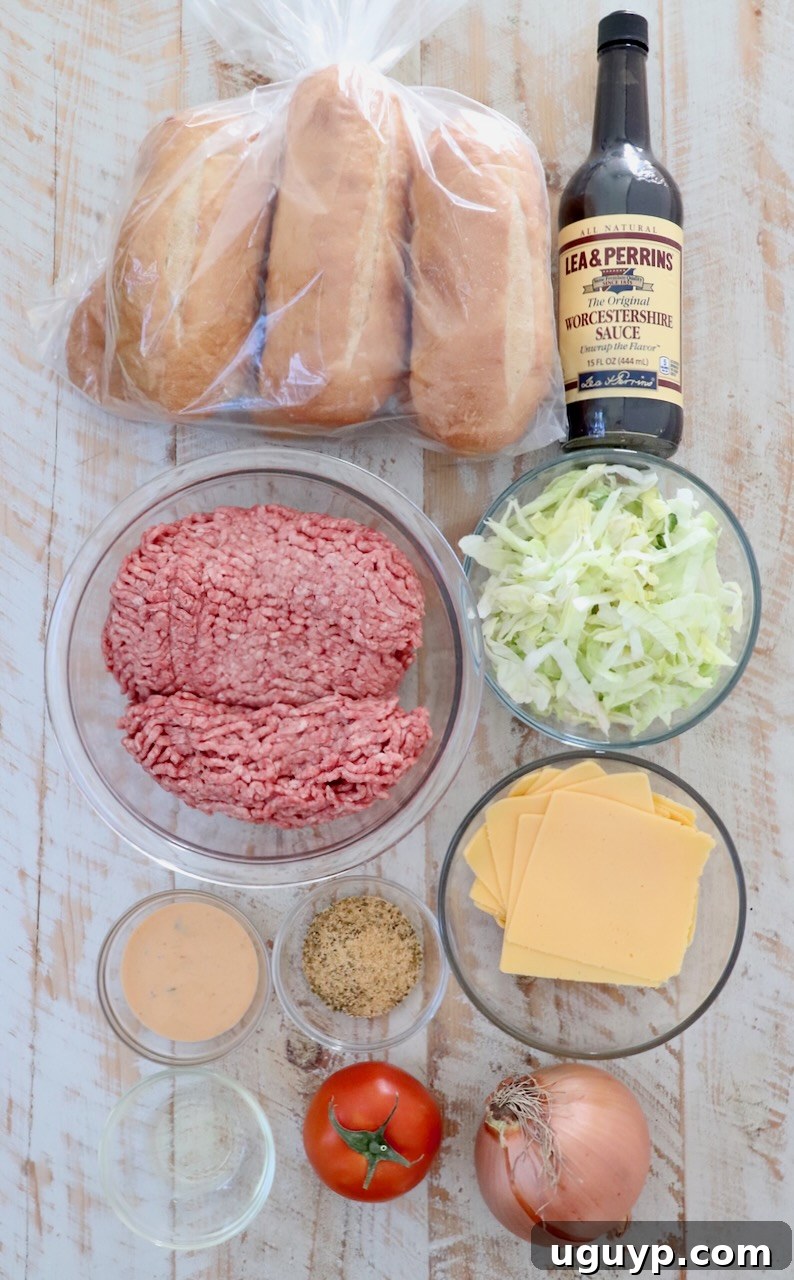 Fresh, vibrant ingredients for a chopped cheese sandwich arranged artfully on a white wooden board, highlighting the quality and simplicity of the components.