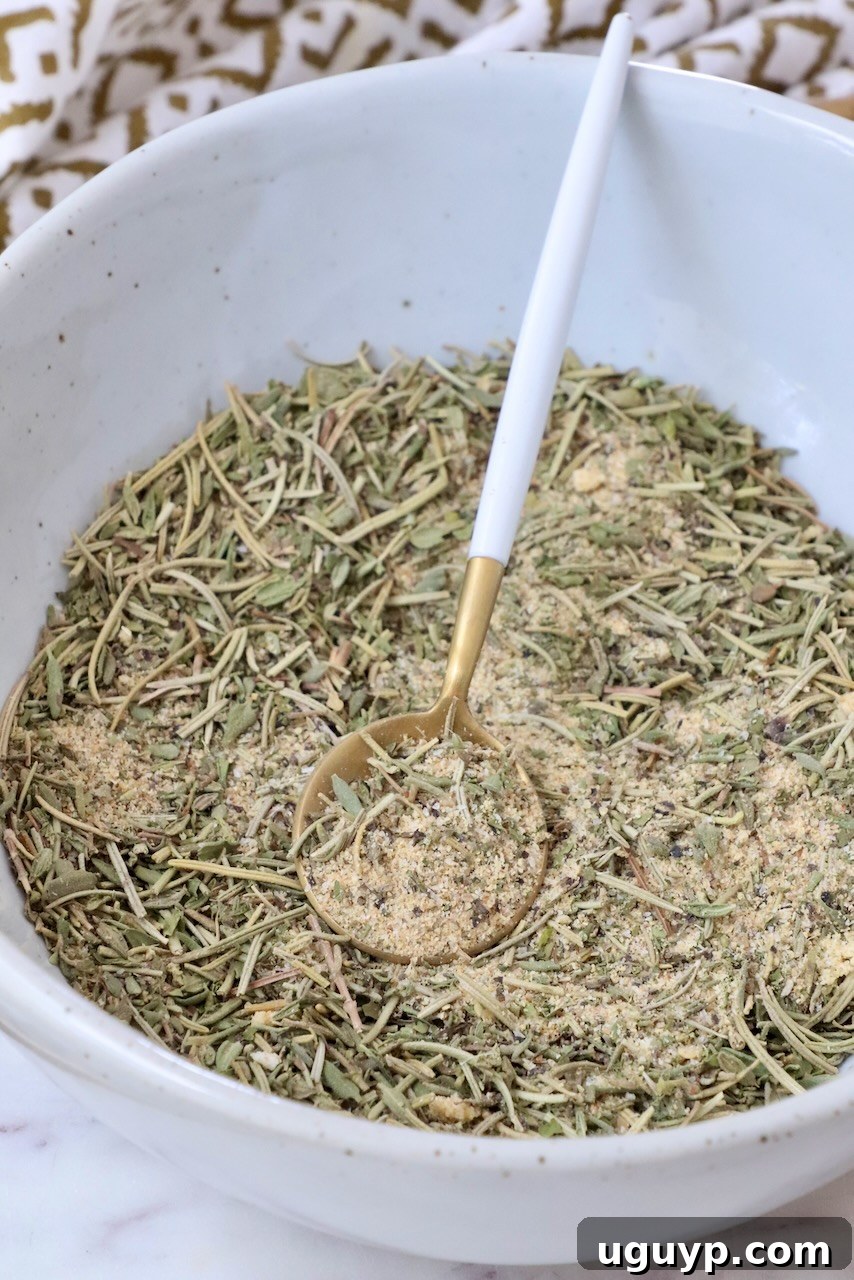 lamb seasoning in a bowl with a spoon, ready for use, emphasizing its homemade quality