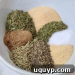 dried herbs and spices separated in a bowl