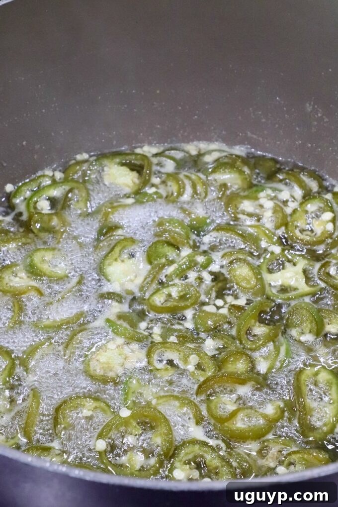 candied jalapenos in a pot