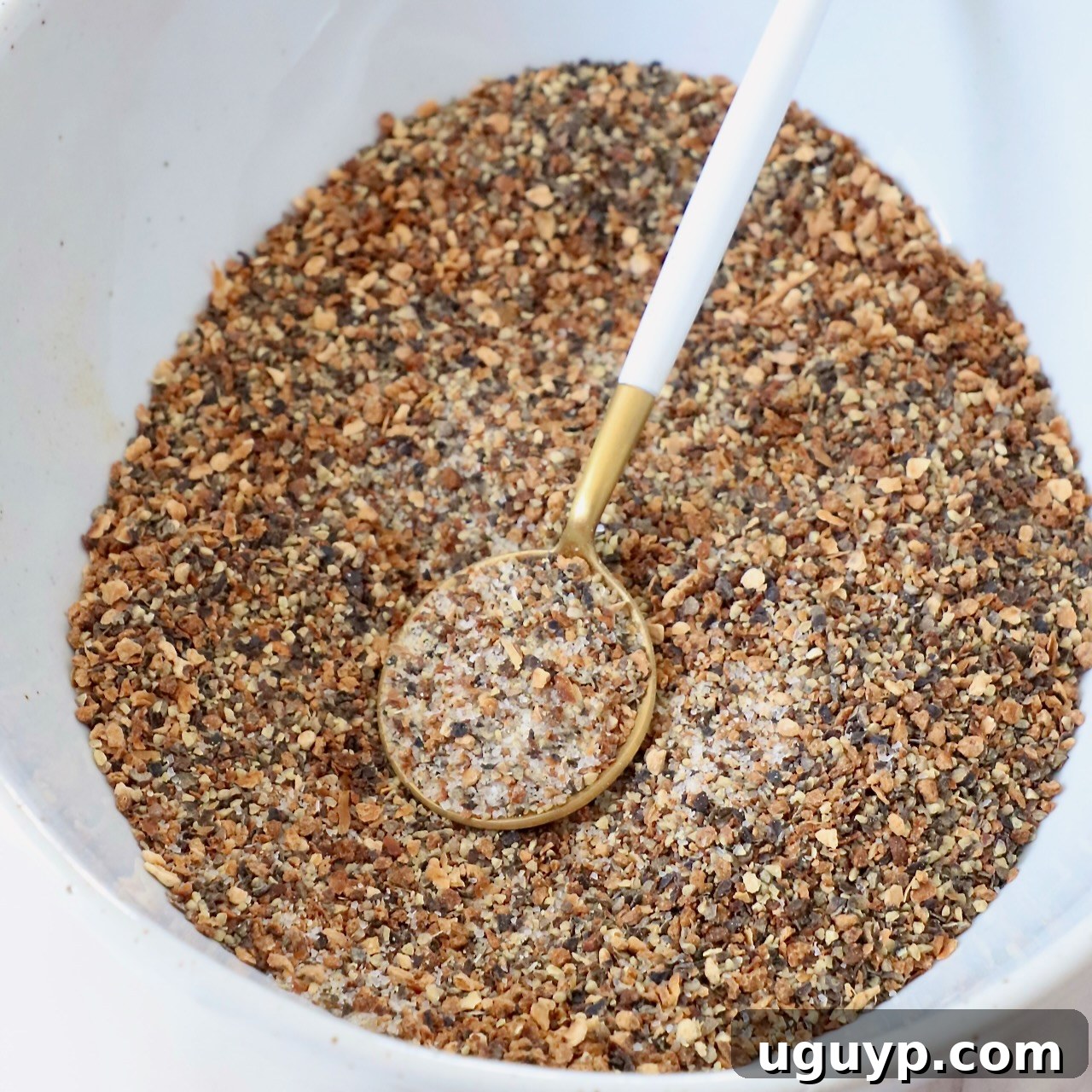 lemon pepper seasoning in bowl with spoon