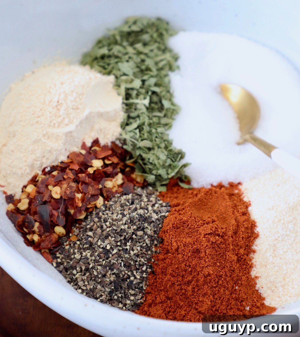 spices and herbs in white bowl