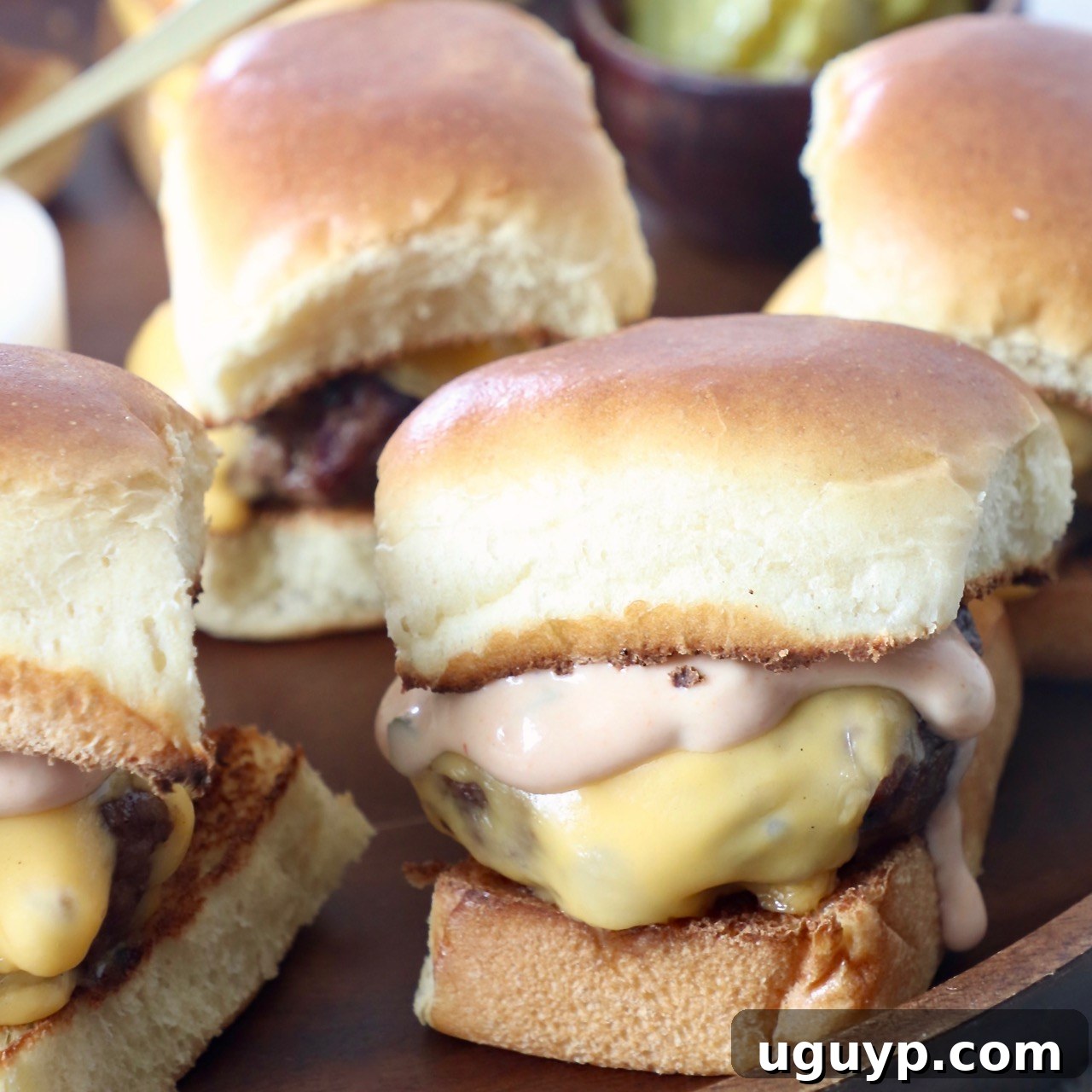 Cheeseburger Sliders arranged on a serving tray, perfect for a party.