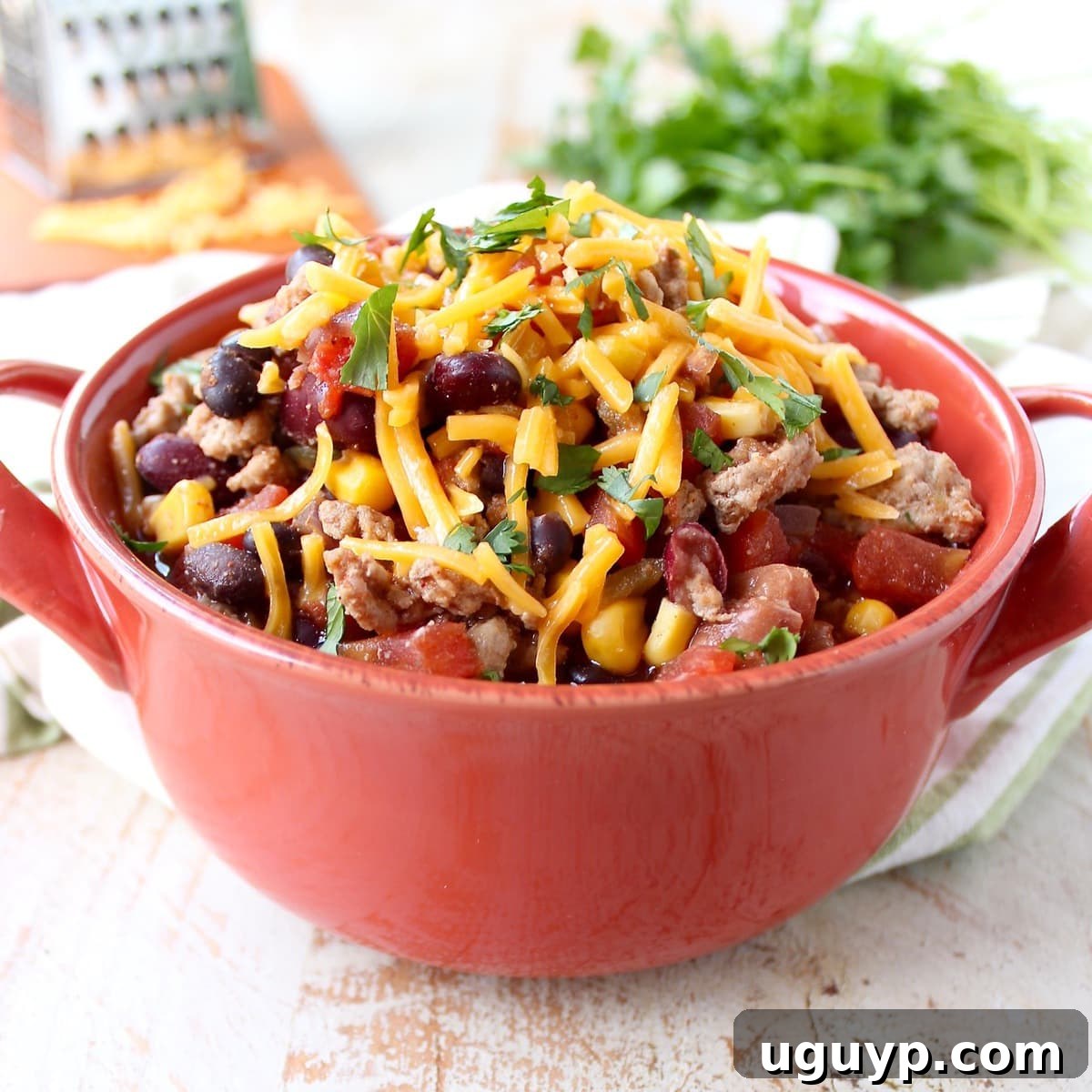 Ground turkey and three kinds of beans are added to one pot to make this protein-packed, easy, and healthy turkey taco soup recipe, ready in only 29 minutes!