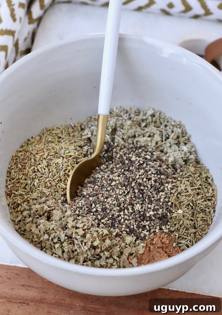 poultry seasoning mixed up in a bowl with a spoon