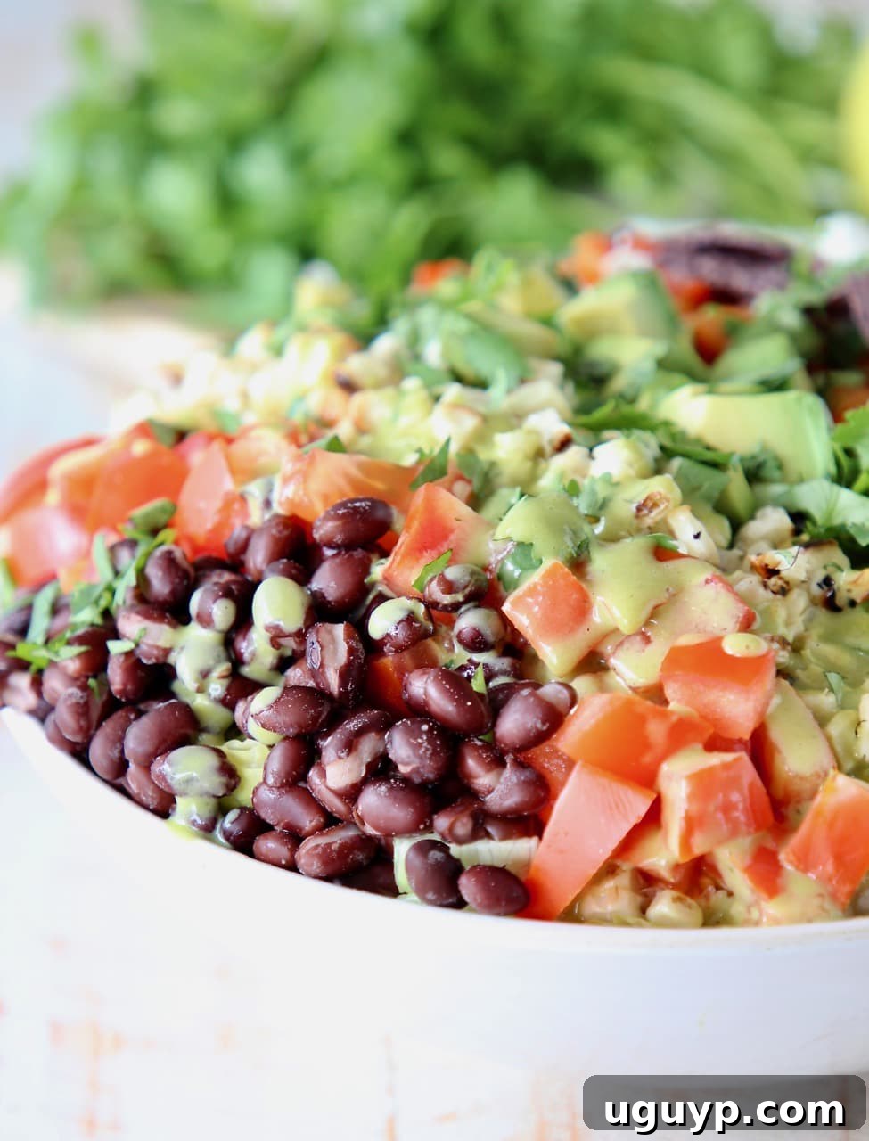 Grilled Romaine Chopped Salad with Black Beans, Tomatoes, Corn and Honey Lime Dressing