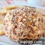 Buffalo cream cheese ball rolled in crushed pecans