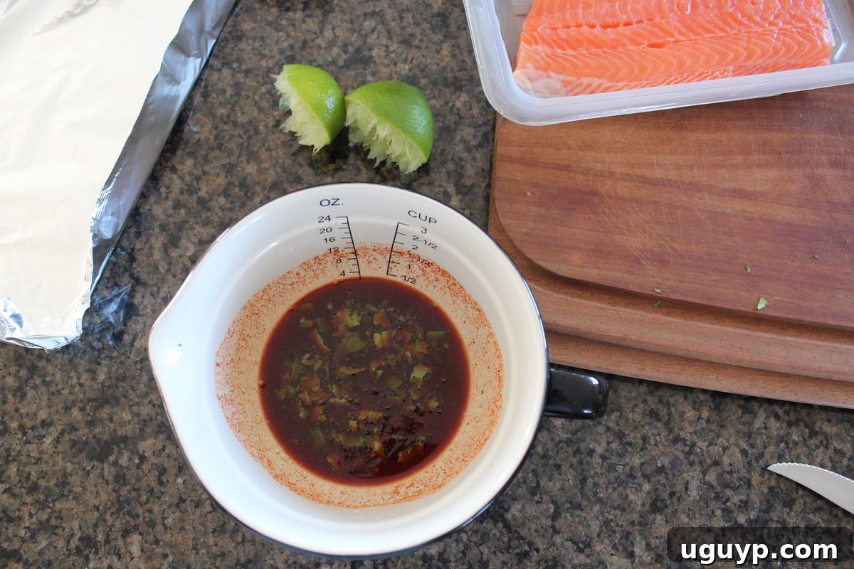 Chipotle Honey Glaze mixture in a small glass mixing bowl