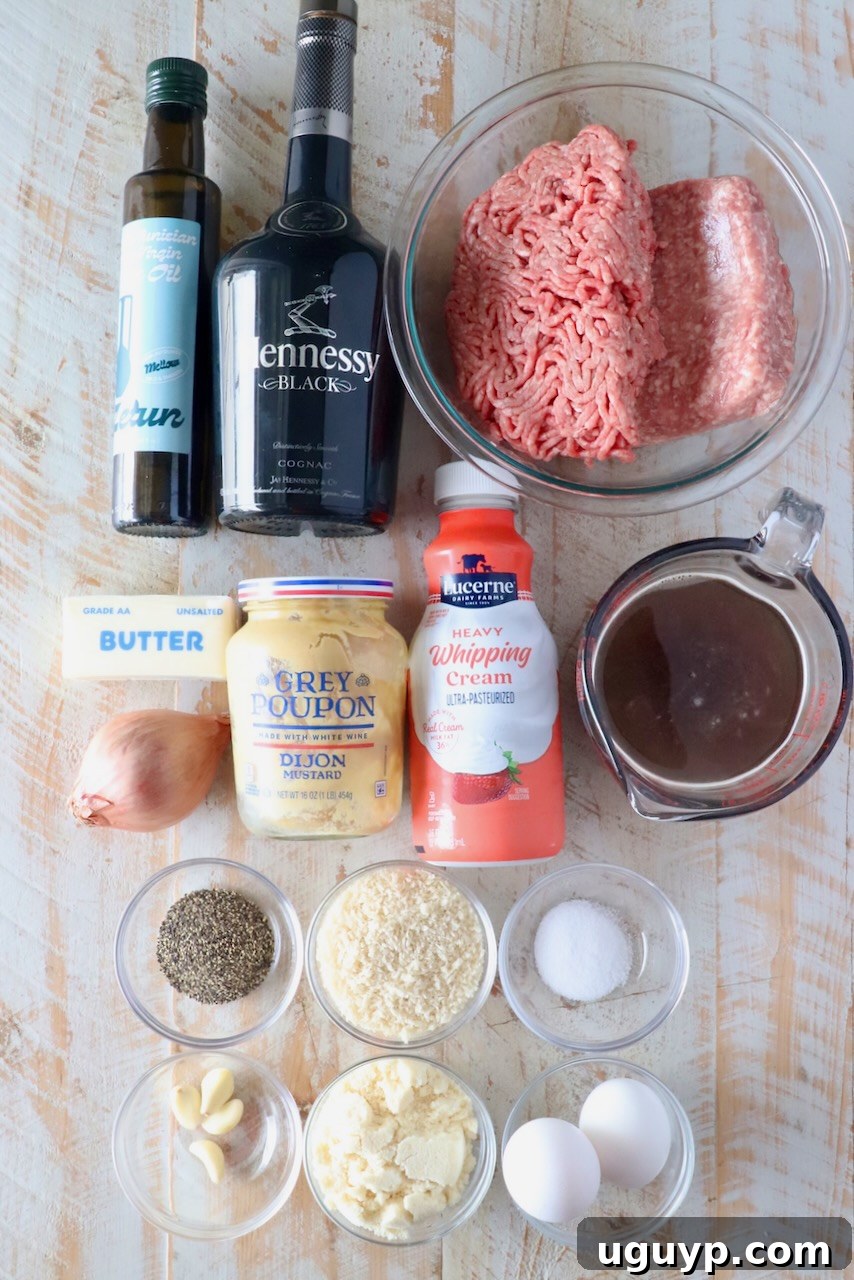 Ingredients for a recipe displayed on a wooden surface include olive oil, Hennessy, ground meat, cream, broth, butter, mustard, eggs, spices, and garlic.