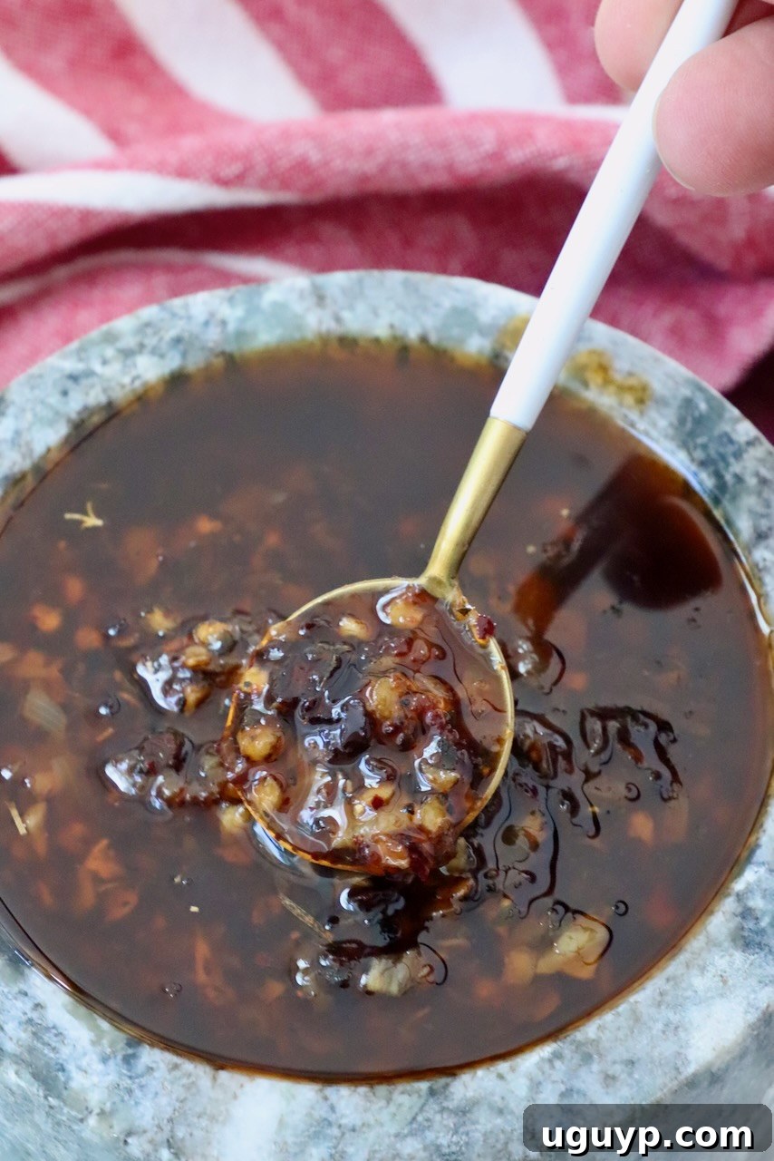 Calabrian chili crisp in a bowl with a spoon