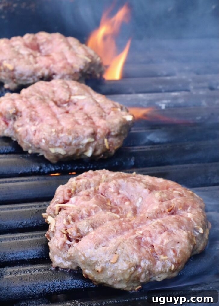 burger patties on a grill