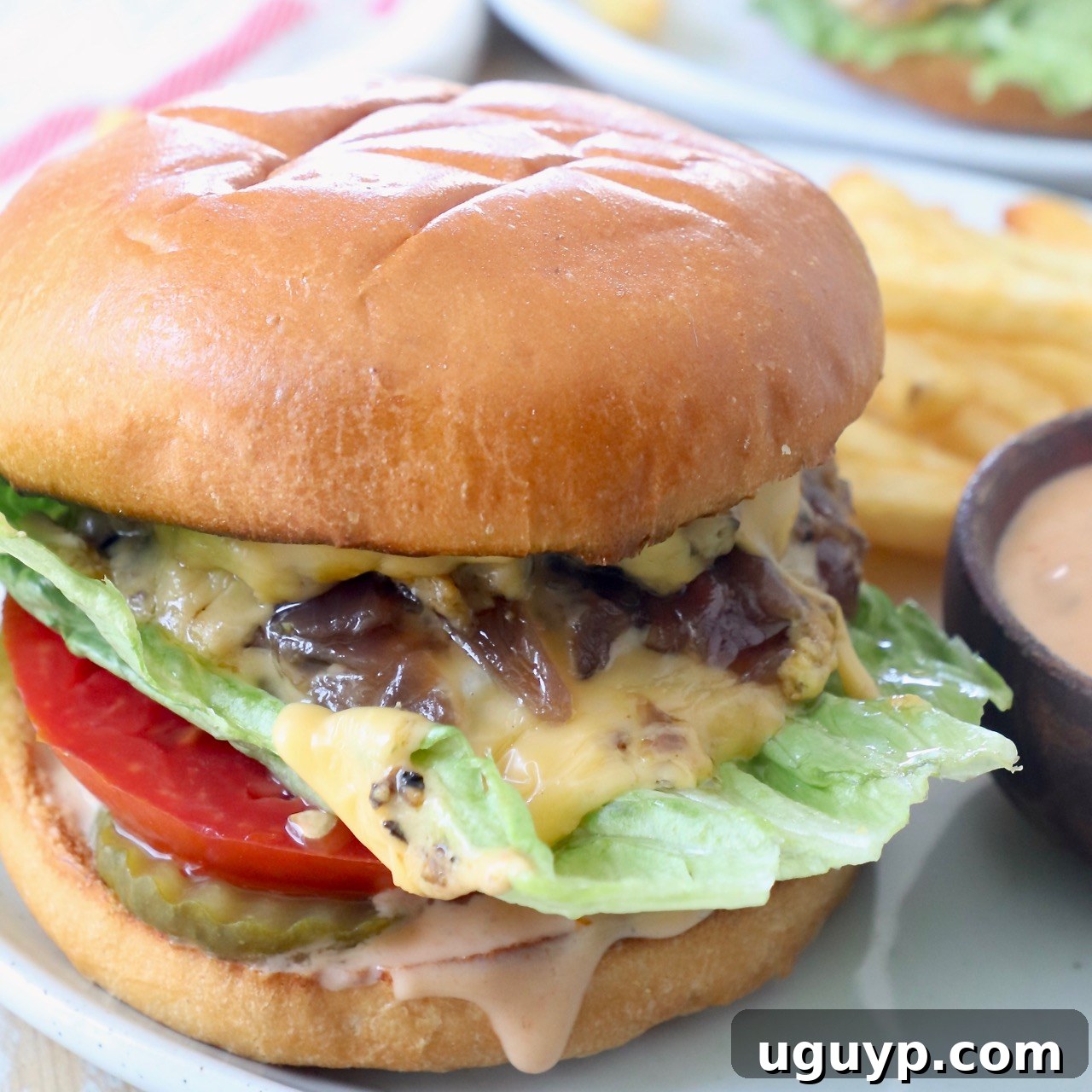 Complete Guide to Crafting Perfect Burgers at Home 17 animal style burger on plate