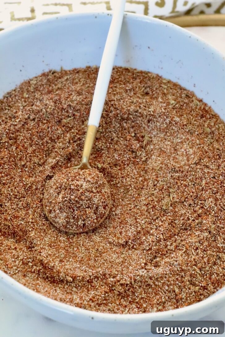 Authentic Mexican Barbacoa Seasoning Recipe 6 barbacoa seasoning in a bowl with a spoon