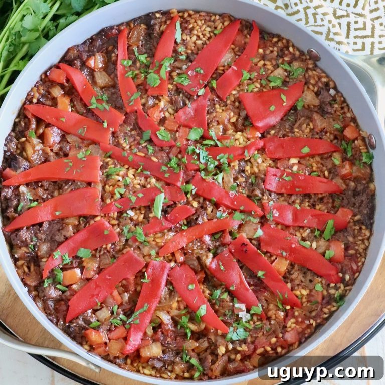 Braised Oxtail Paella with Saffron Rice 83 featured 80497