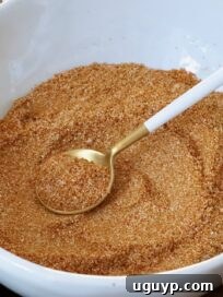 Homemade Chicken Shawarma Spice Blend 8 shawarma seasoning mixed up in a bowl with a spoon