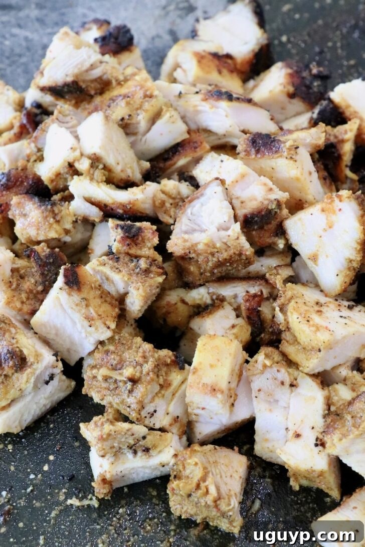 Homemade Chicken Shawarma Tacos Recipe 9 diced shawarma chicken on a cutting board