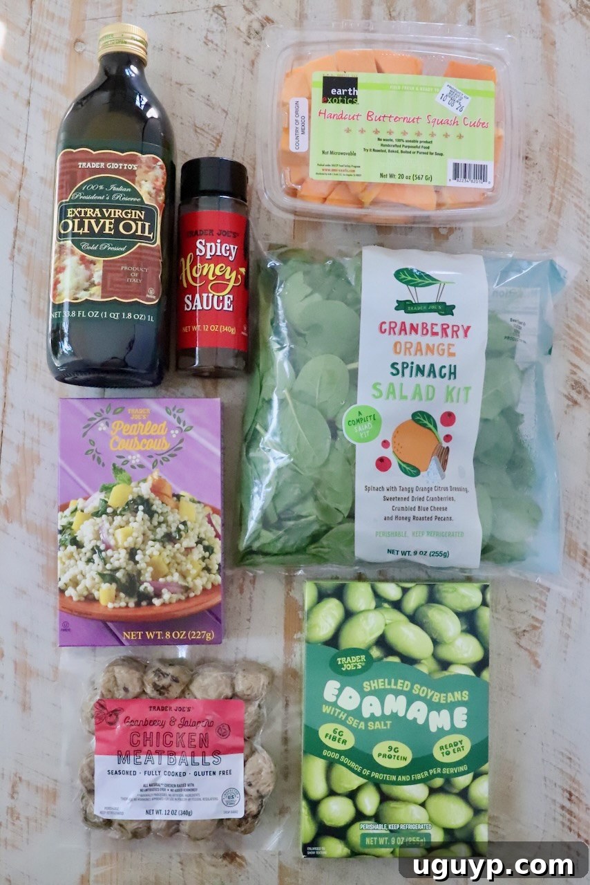 Trader Joe's ingredients lined up on a white wooden surface