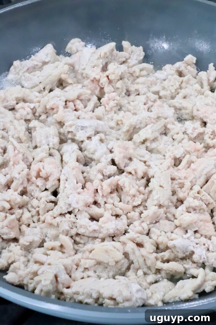 cooked ground chicken in a skillet